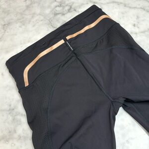 Athleta Allyson Felix Leggings with rose gold, zipper and mesh details, size S.